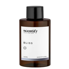 Amber glass bottle with diffuser oil and minimalist label