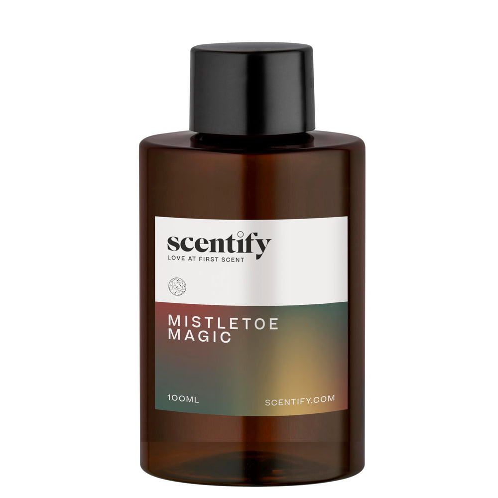 Close-up of Scentify Mistletoe Magic 100ml amber glass bottle