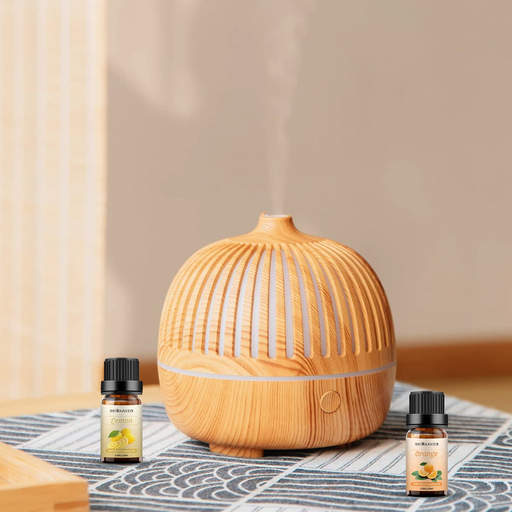 Close-up of Sweet Orange essential oil bottle