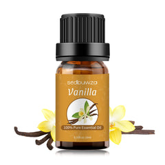 Vanilla essential oil product photography with beans and bottle