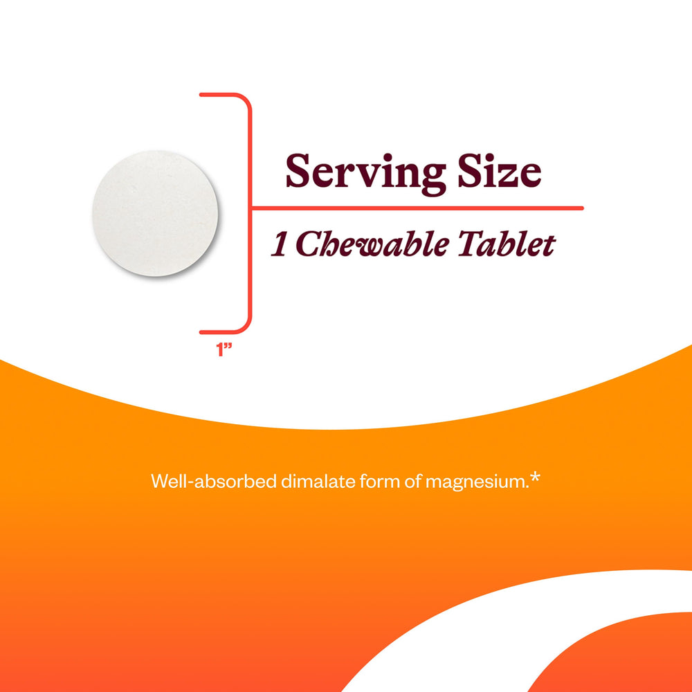 Chewable magnesium tablet next to a glass of water