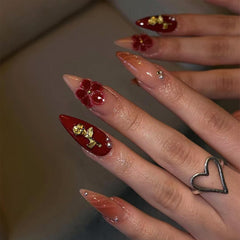 SEENEEY almond press-on nails with red gold flowers design for quick salon manicure at home.