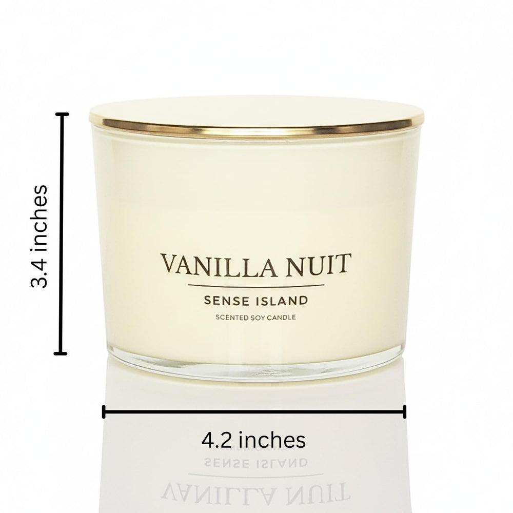 Sense Island Vanilla Nuit 3-Wick beige glass vessel enhances chic home decor.