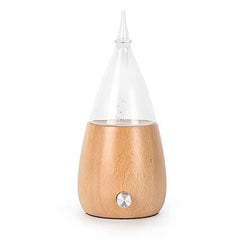 Serenity Namaste diffuser glass-top closeup highlighting pure dry mist.