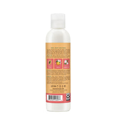 Paraben-free formula blocks humidity while defining curls and waves