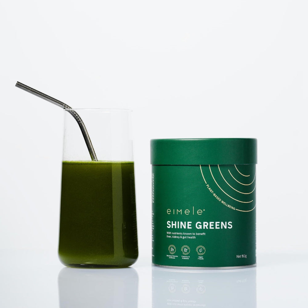 Mixing Shine Greens powder with water or a smoothie