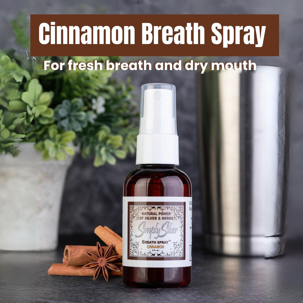 Hands holding spray bottle for dry mouth relief