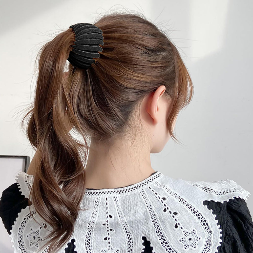 Sizobi clip used during cooking to keep hair tidy in black