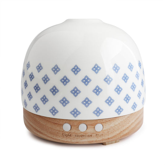 SLMIRACLE luxurious diffuser with blue porcelain pattern delivering calming aromatherapy mist for living spaces.