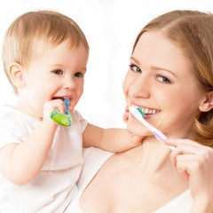 Built-in chewing grip on a baby toothbrush