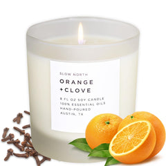 Slow North Orange + Clove Candle in a reusable frosted glass jar