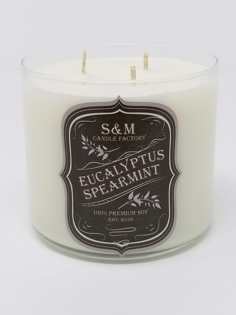 S&M Candle Factory eucalyptus spearmint 3-wick closeup highlights premium soy burn.
