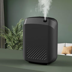 Smartphone showing Scent Tech Bluetooth app controlling diffuser