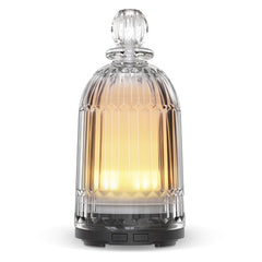 Smartwell diffuser front view with glass cover and black base