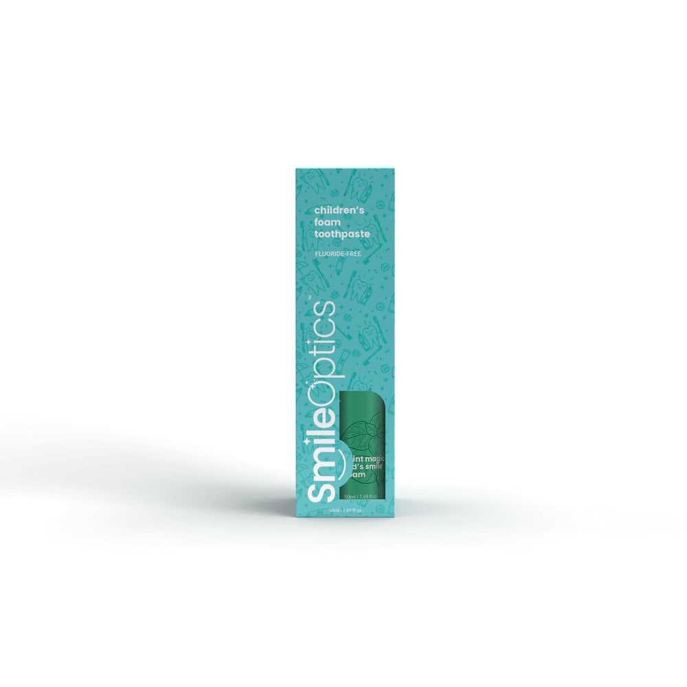Close-up of foaming mint-flavored toothpaste for kids showing the foam texture