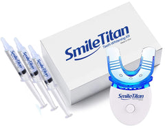 Smile Titan Teeth Whitening Kit with LED Light open showing gel syringes and mouth trays