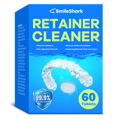 SmileShark Retainer Cleaner tablets dissolving in water with minty scent