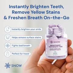 Purple toothpaste tablets arranged on a white surface