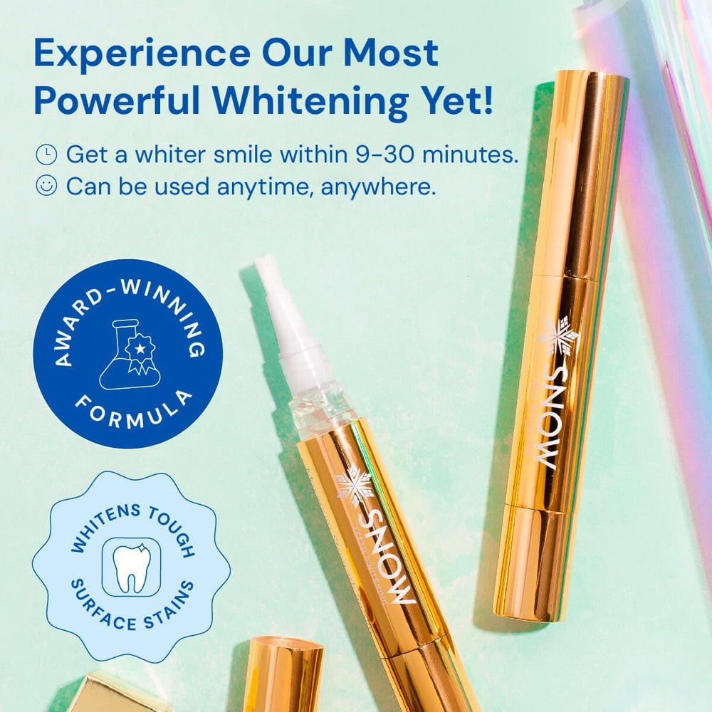 Whitening pen applying serum to teeth