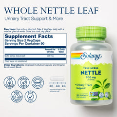 Herbal supplement bottle on white background with nettle leaves