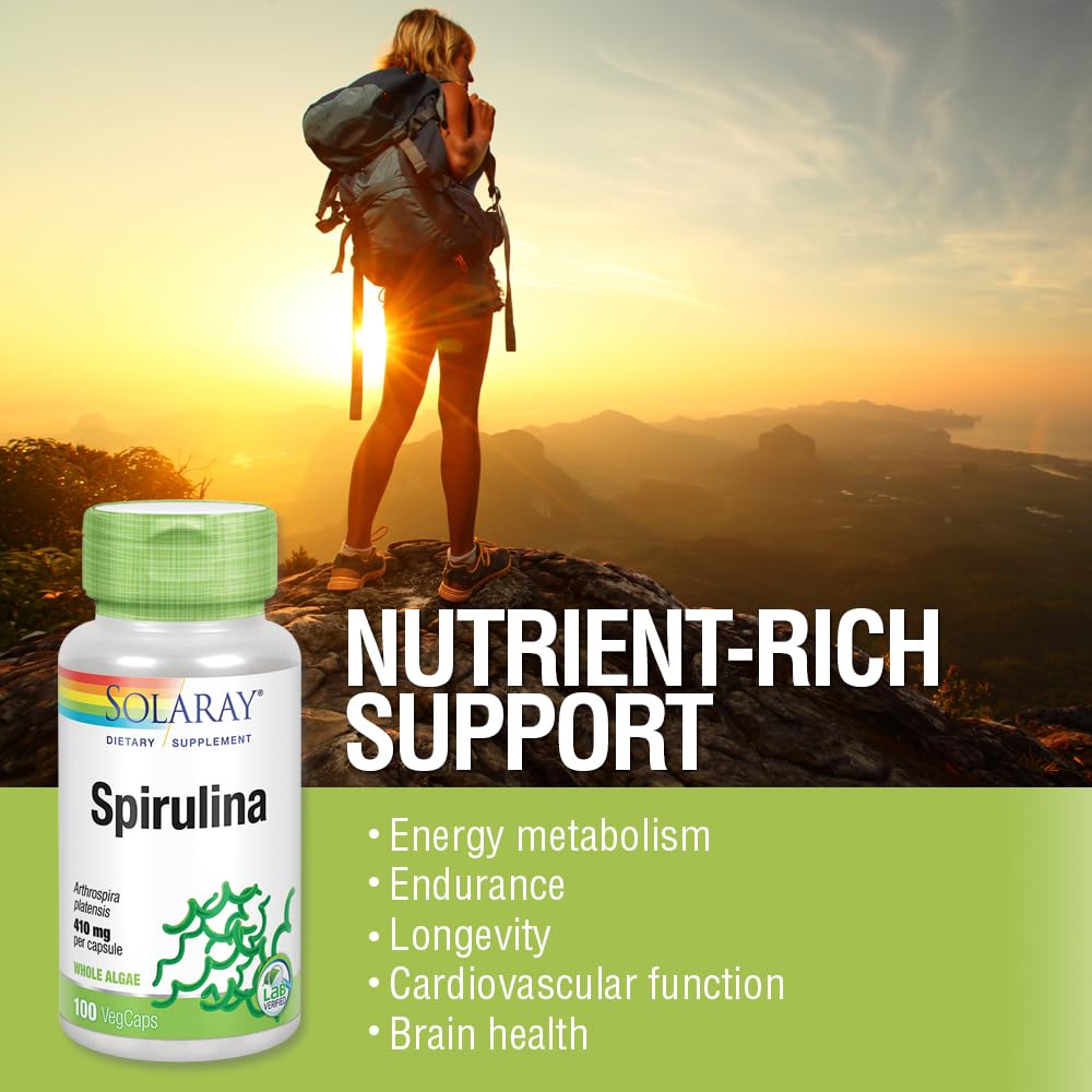 Vegan organic spirulina capsules in bottle