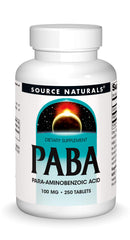 Bottle of Source Naturals PABA 100 mg dietary supplement and tablets on a white background