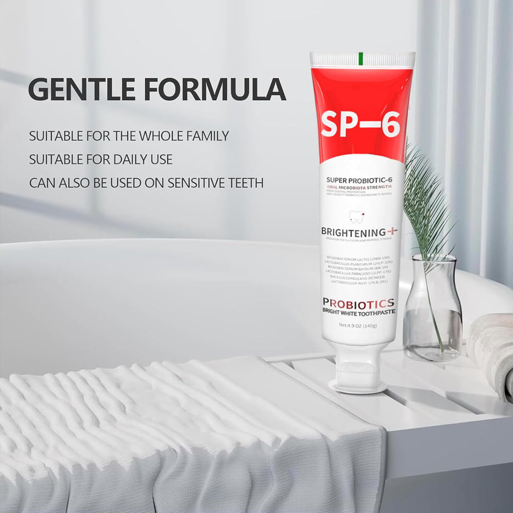 Toothpaste tube on fresh mint background
