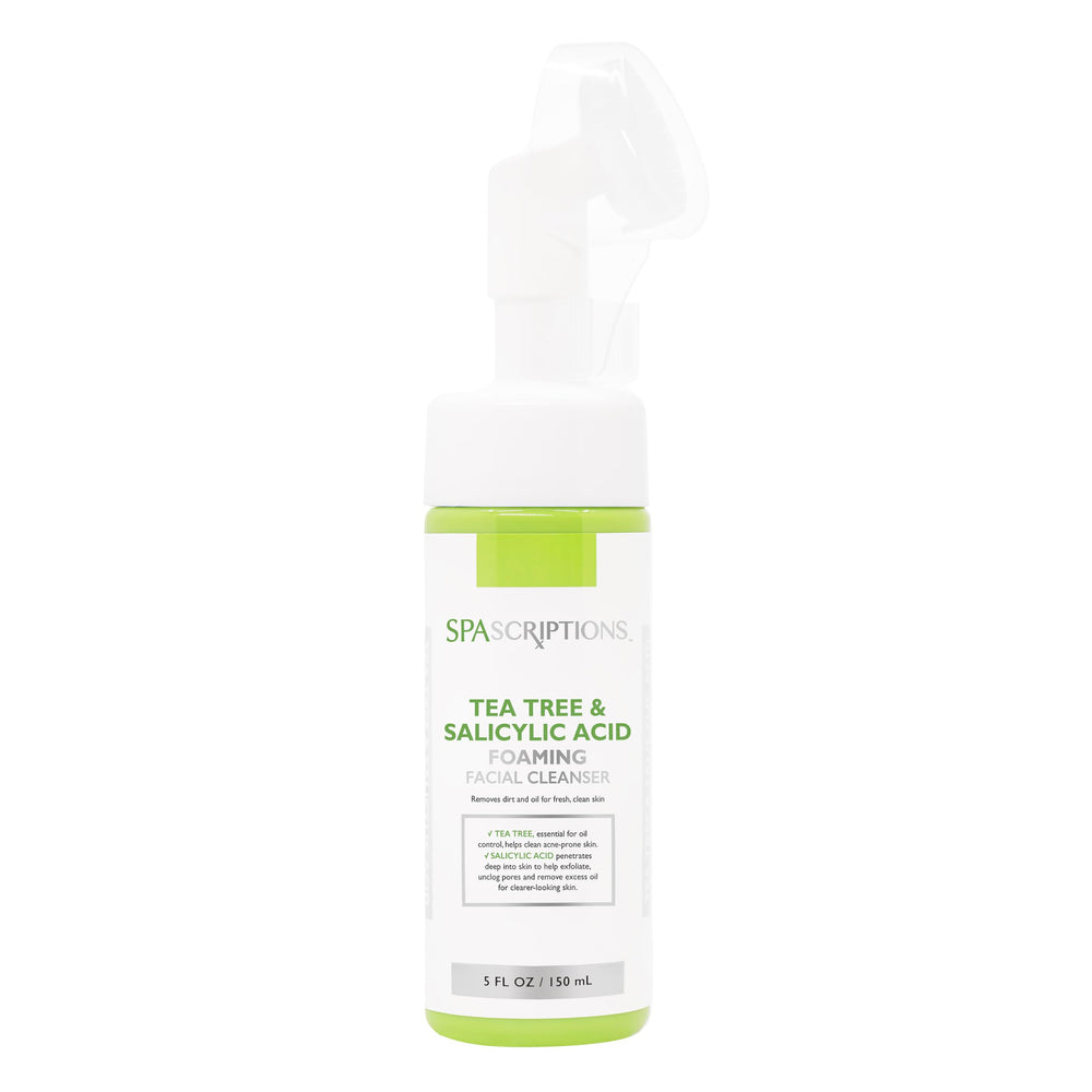 SpaScriptions Tea Tree & Salicylic Acid Foaming Cleanser bottle on a bathroom shelf for oil balance.