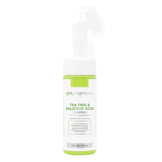 SpaScriptions Tea Tree & Salicylic Acid Foaming Cleanser bottle on a bathroom shelf for oil balance.