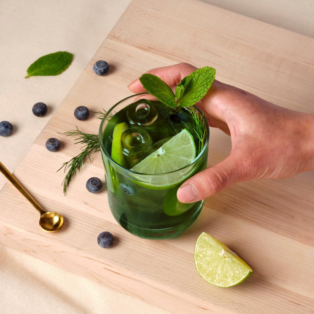 Spearmint leaves with bottle representing flavor
