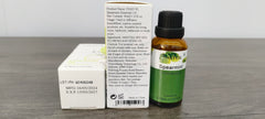 Close-up of spearmint essential oil bottle with dropper