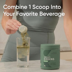 Measuring scoop dispensing Organic Greens powder