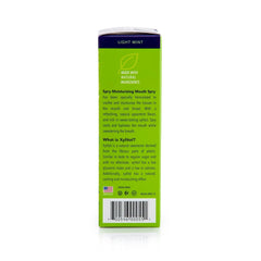 On-the-go use of Spry Dry Mouth Spray with cap removal.