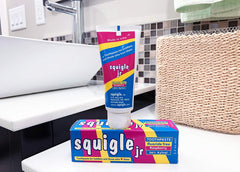 Close-up of Squigle Jr toothpaste packaging