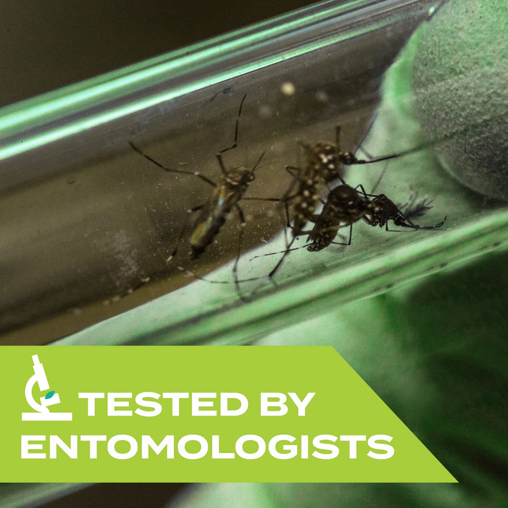 STEM Repels Mosquitoes bottle being sprayed on skin during hike