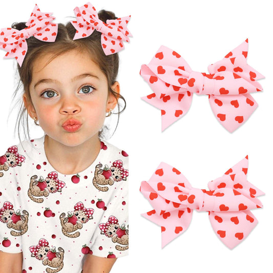 STGDAK Valentine heart bow clip with red print adds cute charm to hairstyles.