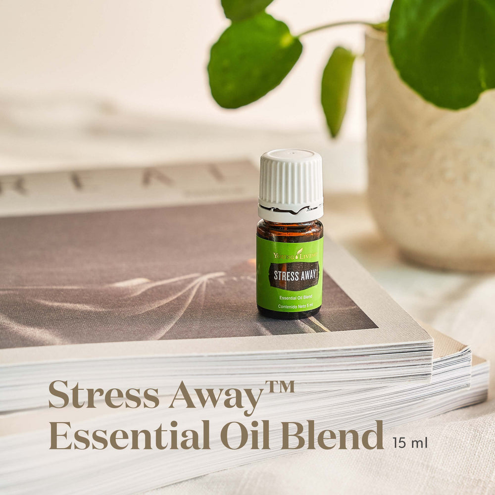 Close-up of Stress Away bottle showing 100% pure essential oil