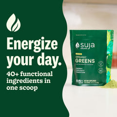 Scoop of greens powder being added to water