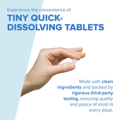 Close-up of iron tablet dissolving on contact