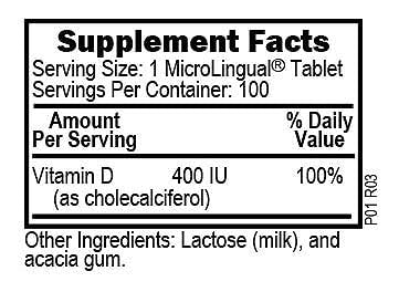 Close-up of Vitamin D3 400 IU tablets dissolving under the tongue