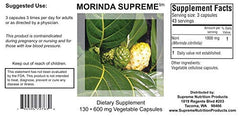 Close-up of a single Morinda Supreme capsule illustrating pure noni powder and easy swallowing benefit