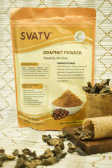 Applying soapnut paste to hair