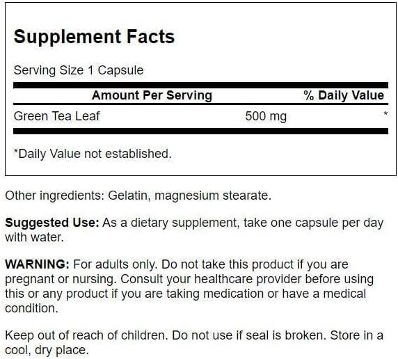 Close-up of Swanson Green Tea Extract supplement capsules with label