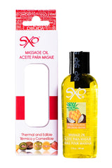 SXO Piña Colada massage oil bottle on tropical background