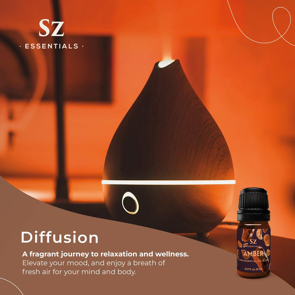 Aromatherapy setup with diffuser and amber essential oil