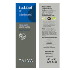 TALYA black seed oil bottle displayed on a surface