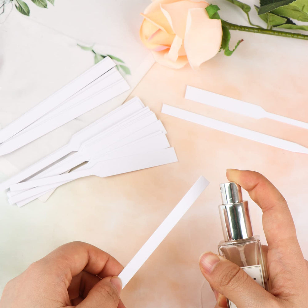 Test strips for perfumes and essential oils