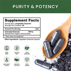 Teeth whitening and oral health with activated charcoal capsules