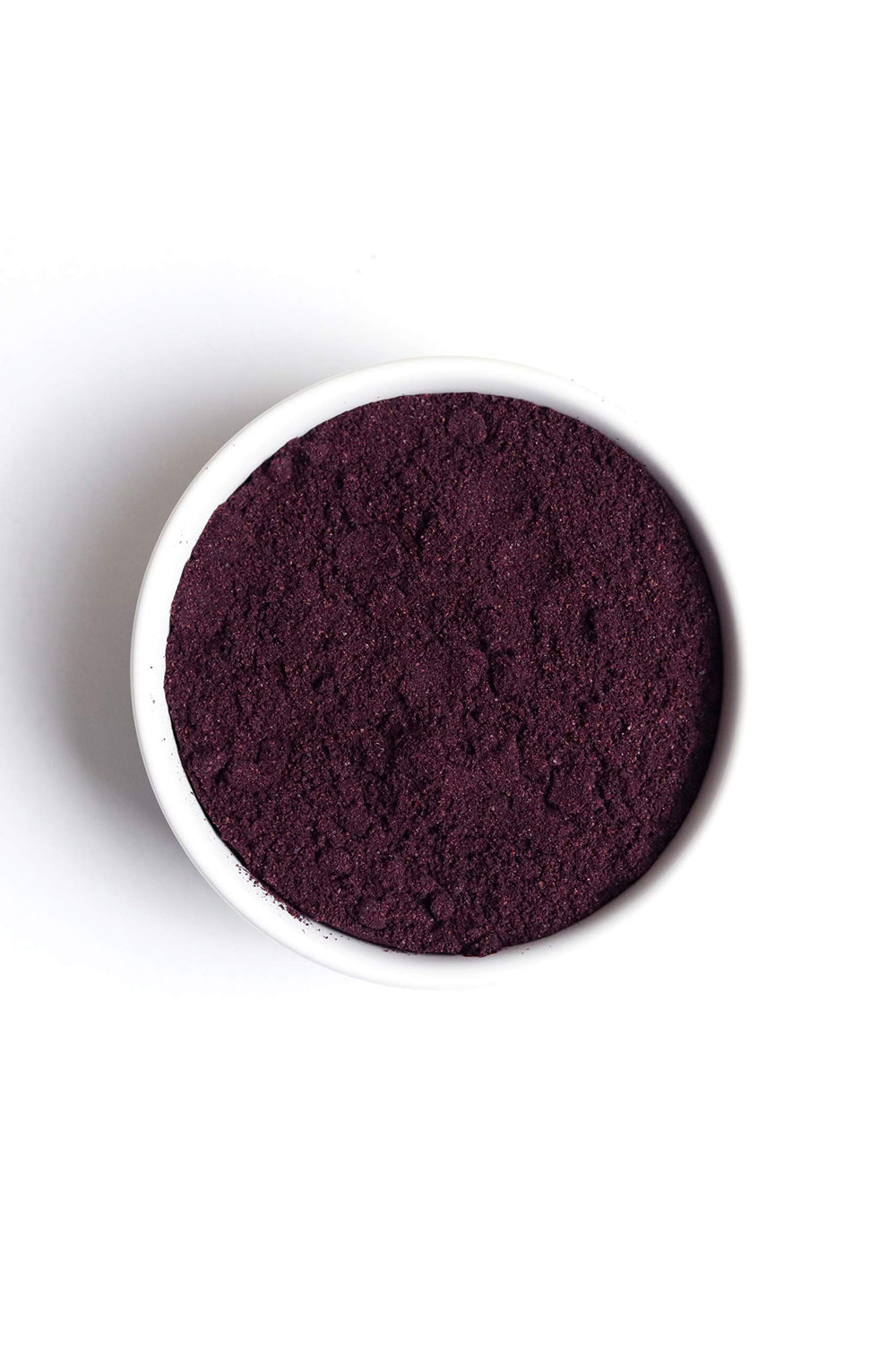 Elderberry powder being added to smoothie