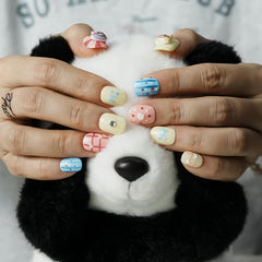 Tesytto plaid nails add cute detail to casual outfits